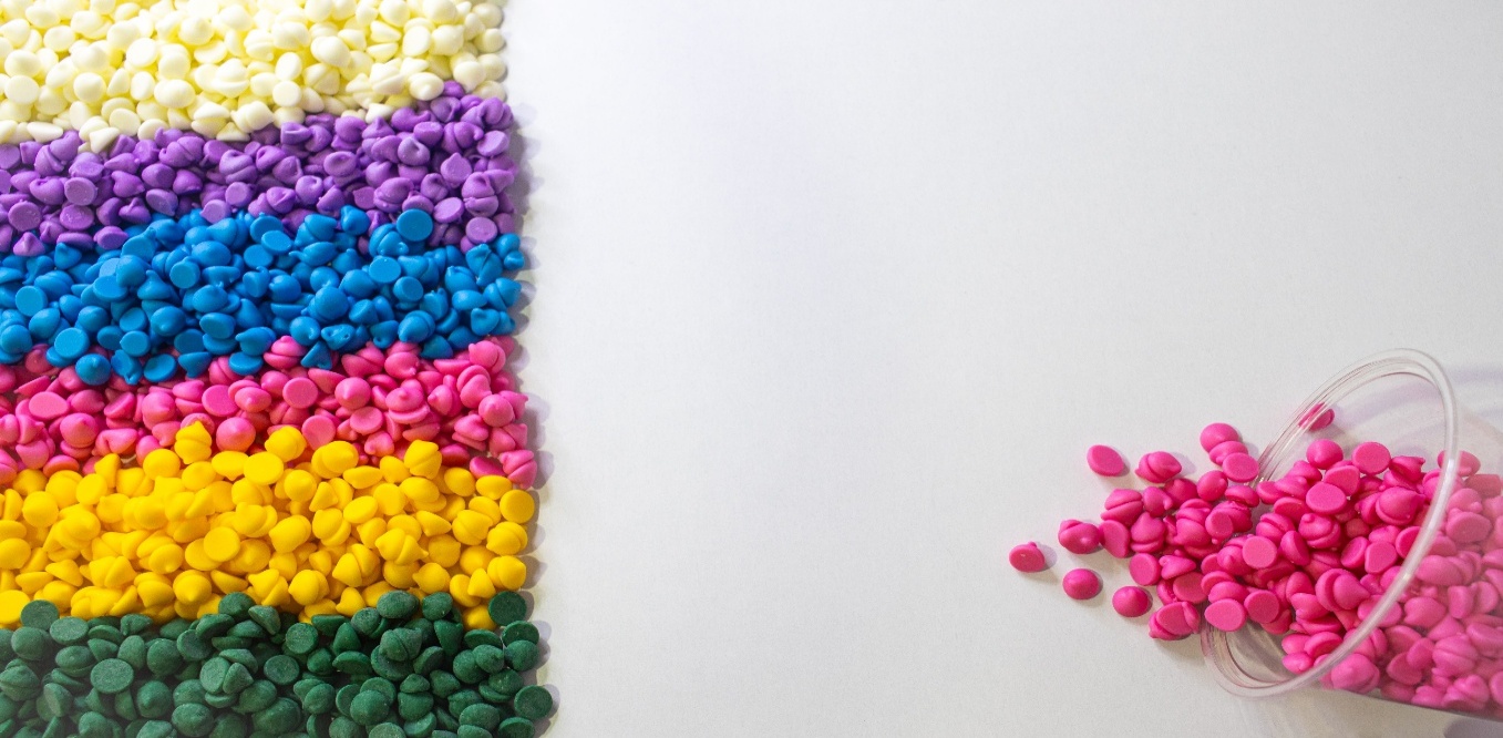 Colored plastic masterbatch pellets used for coloring plastic resin.